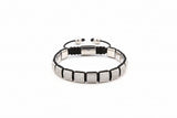 Bracelet with black and silver design on a white background