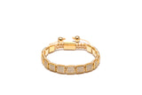 An 18K gold-plated bracelet with cubic zirconia diamond and small clear crystals, displayed against a white background.